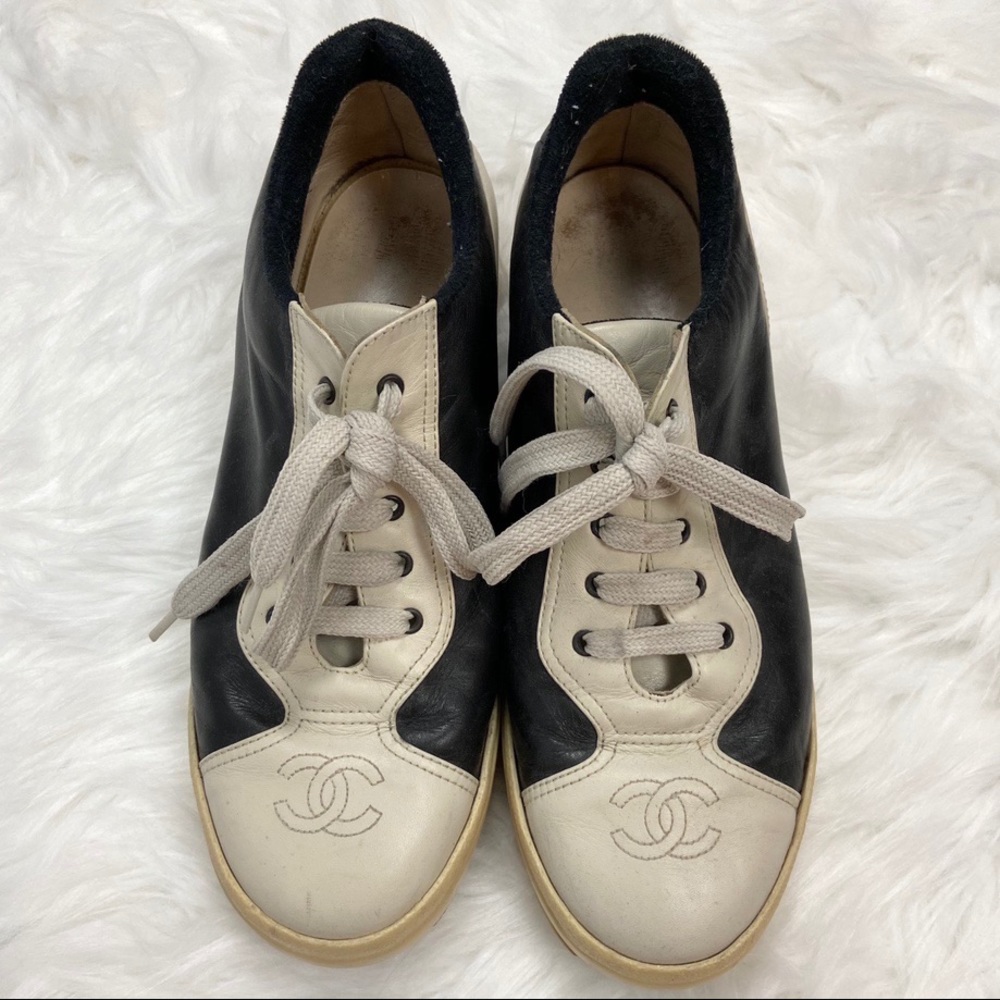 Vintage Chanel black and white leather sneakers